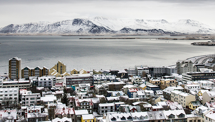 Snow-covered Reykjavík, Iceland with mountain backdrop
